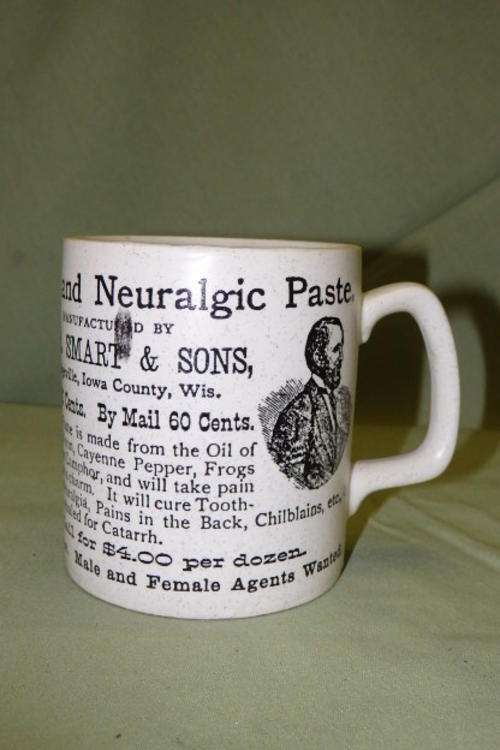 A VERY UNUSUAL CERAMIC WR SMART & SONS "RHEUMATIC AND NEURALGIC PASTE" BRANDED MUG