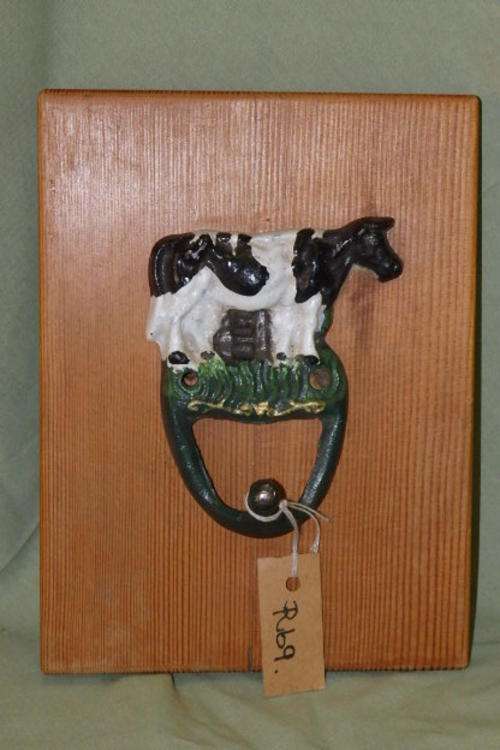 AN AWESOME HAND PAINTED CAST METAL COW "HOOK" MOUNTED ON AN OAK BASE - PERFECT FOR A KITCHEN APRON