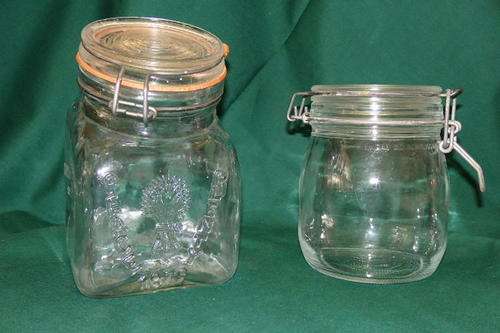 TWO WONDERFUL VINTAGE HINGED LIDDED GLASS COOKIE/ STORAGE JARS INCLUDING AN ITALIAN MADE JAR