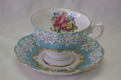 AN SUPERB VINTAGE ROYAL ALBERT OF ENGLAND "ENCHANTMENT" CUP AND SAUCER SET IN THE MALVERN SHAPE