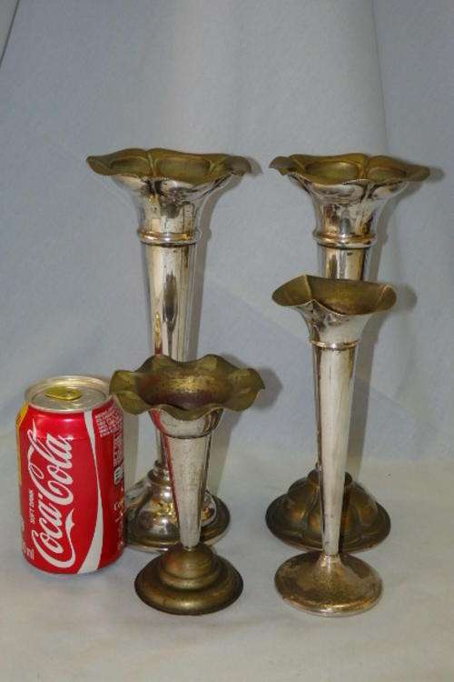 AN AWESOME COLLECTION OF FOUR ANTIQUE SILVER PLATED (ON BRASS) "FLUTED" CANDLE HOLDERS