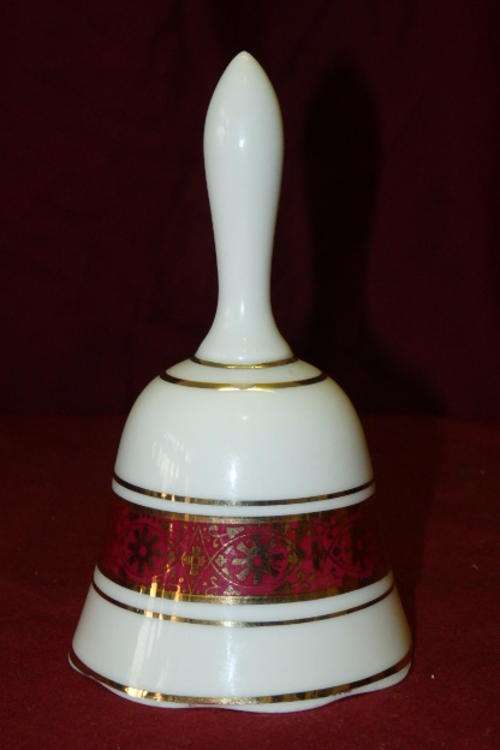 A STUNNING GERMAN MADE REUTTER PORCELAIN HANDBELL WITH BAD DURKHEIM BRANDING
