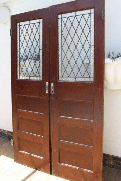 A STUNNING PAIR OF VINTAGE LEAD GLASS SOLID OREGON DOORS IN GREAT CONDITION FOR THE AGE!!!