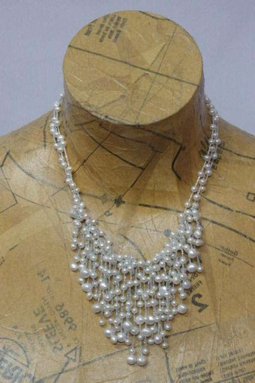 A SPECTACULAR GENUINE PEARL NECKLACE WITH A MULTITUDE OF GORGEOUS CULTURED WHITE PEARLS