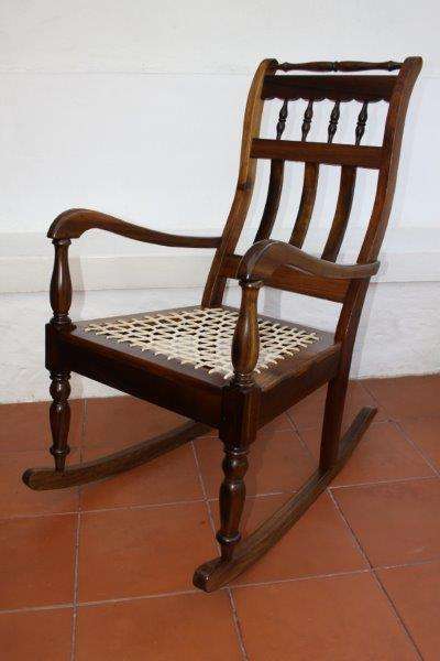 WOW! A GORGEOUS JONKER of KNYSNA SOLID STINKWOOD & RIEMPIE ROCKING CHAIR THAT BELONGED TO GENE LOUW!