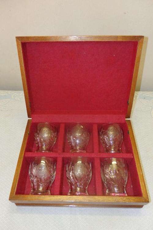 A MAGNIFICENT SET OF SIX "ROSE" CUT CRYSTAL WHISKEY GLASSES IN A RED VELD LINED WOODEN DISPLAY BOX