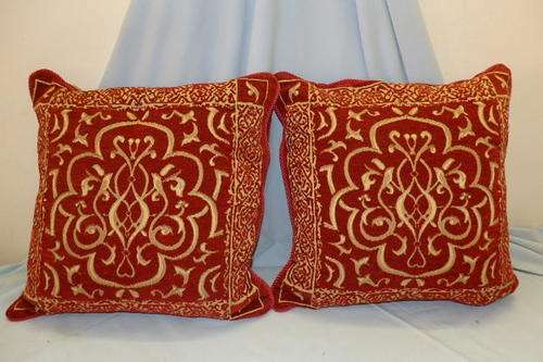 Red and beige pillows top