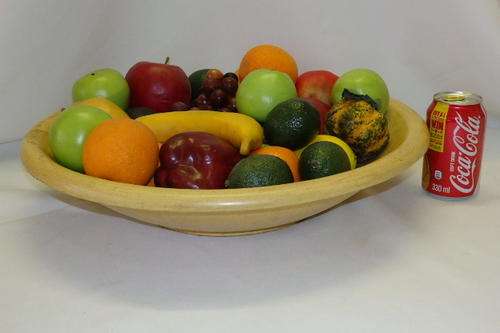 A HUGE ROUND "NUTMEG COLOURED" POTTERY DISPLAY BOWL WITH A FABRIC LINED BASE