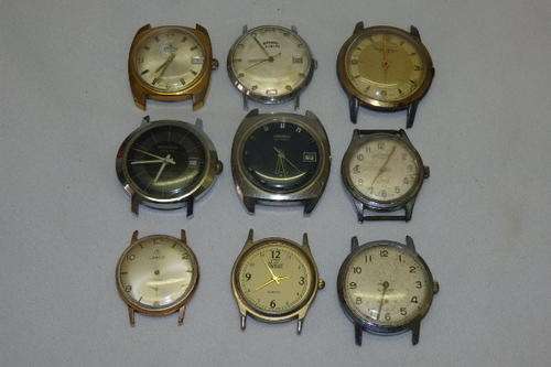 AN AWESOME COLLECTION OF NINE DIFFERENT VINTAGE MENS WATCH FACES FOR RESTORATION OR PARTS bid/watch