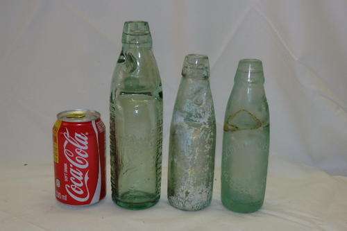 THREE AMAZING ANTIQUE (LATE 1800's) GLASS CODD-NECK BOTTLES WITH MARBLES IN THE BOTTLES bid/bottle