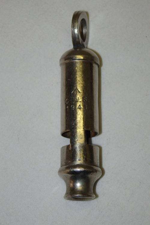 A RARE WORLD WAR II BROAD ARROW "CWS" 1941 MILITARY AIR RAID PRECAUTION WARDENS WHISTLE
