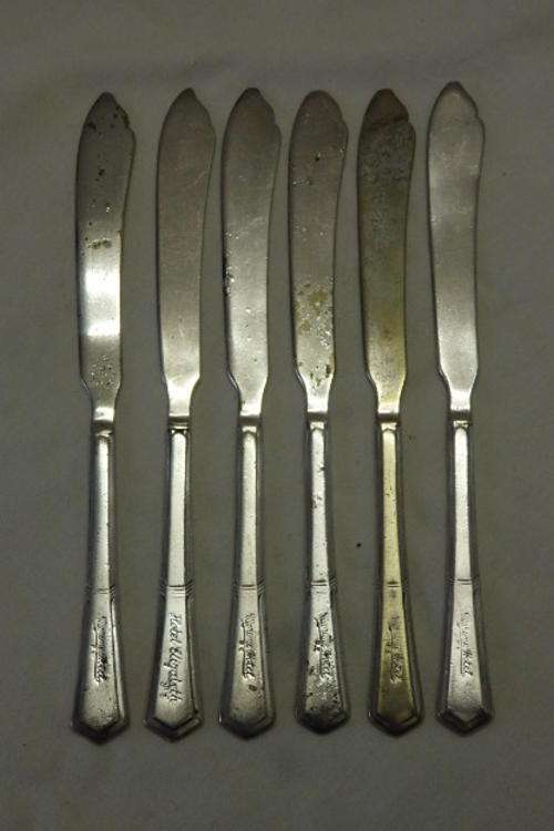 AN AMAZING SET OF SIX VINTAGE/ ANTIQUE? SILVER PLATED "MARINE HOTEL - PORT ELIZABETH" BUTTER KNIVES