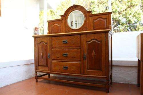 AN EXQUISITE GENUINE ANTIQUE OAK DRESSER WITH ORIGINAL BEVELLED ROUND MIRROR; SPECTACULAR FURNITURE!