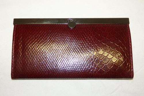AN EXQUISITE FAUX SNAKE SKIN LADIES PURSE/ WALLET WITH A GUNMETAL GREY FRAME