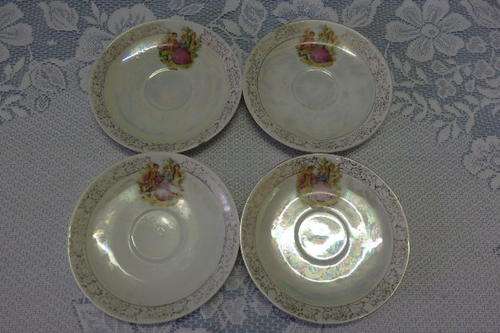 A WONDERFUL COLLECTION OF FOUR CZECHOSLOVAKIAN PORCELAIN SAUCERS WITH A VICTORIAN THEME bid/saucer