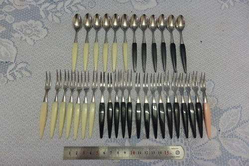 A STUNNING SET OF 34 ASSORTED 18/8 STAINLESS STEEL COCKTAIL FORKS AND SPOONS
