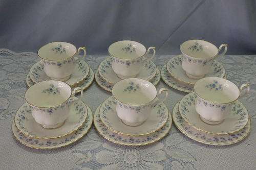 A MAGNIFICENT COLLECTION OF SIX ROYAL ALBERT TEA SET TRIOS IN THE "MEMORY LANE" PATTERN bid/trio