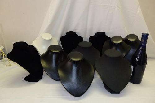 A COLLECTION OF TEN ASSORTED JEWELLERY DISPLAY BUSTS IN ASSORTED SIZES AND FABRICS
