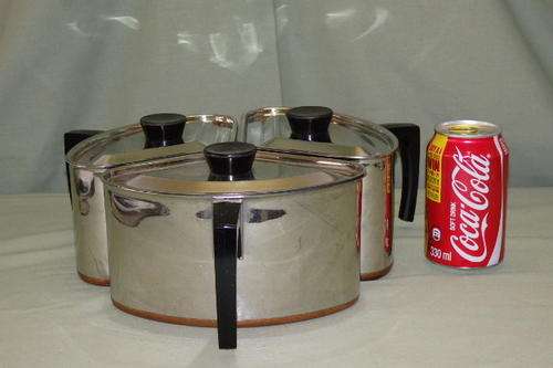 AN INCREDIBLE SET OF THREE VINTAGE COPPER BOTTOM POINTERWARE "TRIANGULAR" COOKING POTS