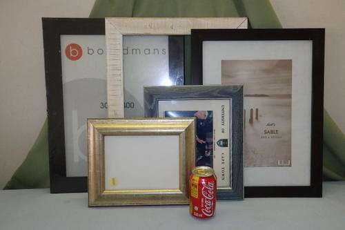 A WONDERFUL COLLECTION OF FIVE ASSORTED PICTURE FRAMES INCLUDING WOODEN FRAMES bid/frame