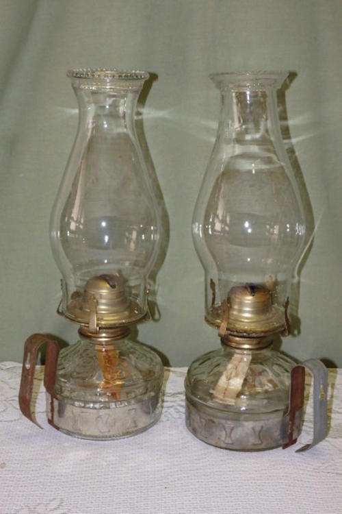 TWO AWESOME VINTAGE GLASS PARAFFIN LANTERNS W/ CARRY HANDLES INCL. A PANDA BRAND LANTERN bid/lantern