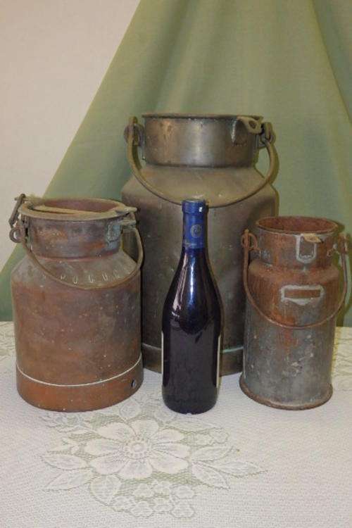 THREE AWESOME (DIFFERENT SIZE) VINTAGE METAL CREAM CANISTERS INCL. A TSP CANISTER bid/canister