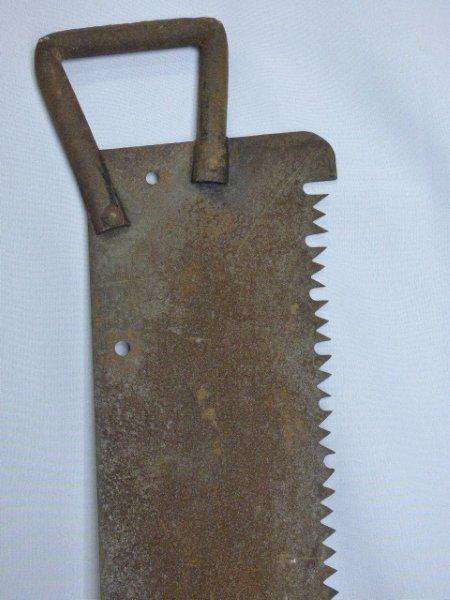 AN AWESOME VINTAGE METAL TWO MAN CUTTING SAW. STUNNING PROP OR ORNAMENT!!!