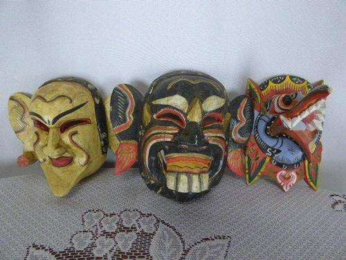 THREE UNUSUAL & DIFFERENT HAND CARVED AND PAINTED ORIENTAL/INDONESIAN MASKS. SOMETHING DIFFERENT!!