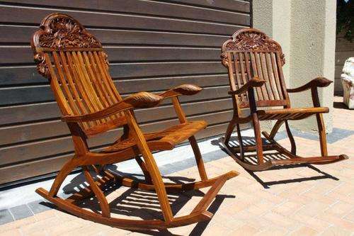 AN EXQUISITE PAIR SOLID TEAK ROCKING CHAIRS w MAGNIFICENT HAND CARVED DETAIL - GORGEOUS FURNITURE!!!