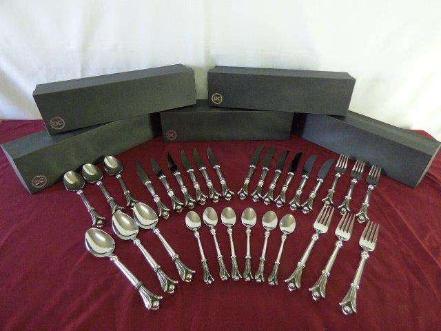 A MAGNIFICENT, ELITE, DIANA CARMICHAEL STAINLESS STEEL & PEWTER *OSTRICH FEATHER* CUTLERY SET.