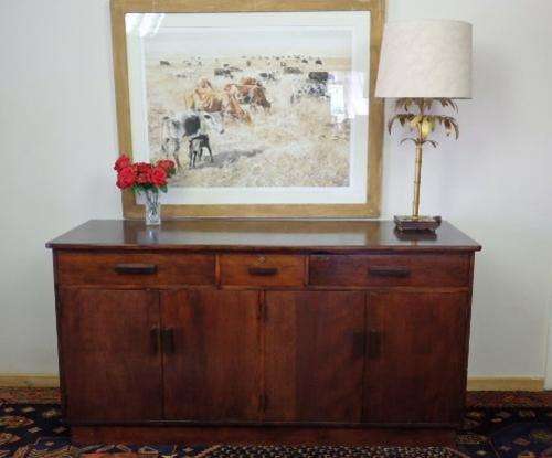 A STUNNING LARGE CABINET WITH THEE SPACIOUS DRAWERS AND AMPLE PACKAGE SPACE IN THE CUPBOARD