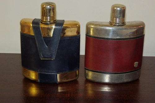 TWO WONDERFUL "BOOZE" HIP FLASKS WITH FAUX LEATHER COVERS IN GOOD CONDITION