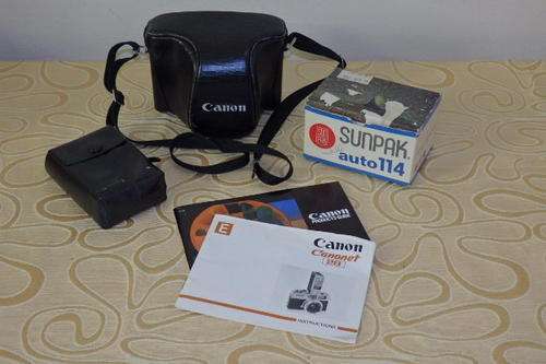 AN AWESOME CANON "CANONET 28" 35mm CAMERA & FLASH WITH THE INSTRUCTION BOOKLETS