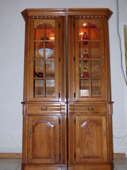 TWO MAGNIFICENT TALL OAK DISPLAY CABINETS w LIGHTS, CAN STAND TOGETHER OR AS SEPARATE CORNER UNITS!