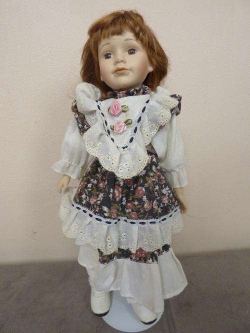 A GORGEOUS, BEAUTIFUL PORCELAIN DOLL, FABULOUS FOR A LITTLE GIRLS ROOM OR TO ADD TO A COLLECTION!!!