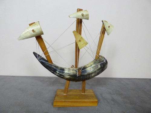 A VERY UNIQUE HAND MADE COW HORN SAILING SHIP. BEAUTIFUL ON DISPLAY!!