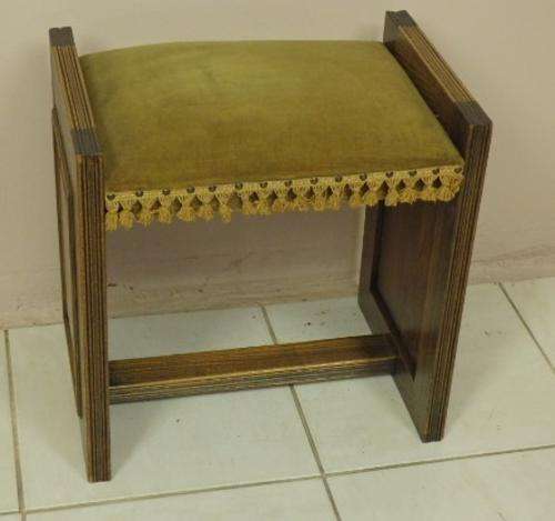 A VERY BEAUTIFUL SOLID "DARK" OAK STOOL WITH A DEEP GREEN VELVET SEAT AND TASSELS