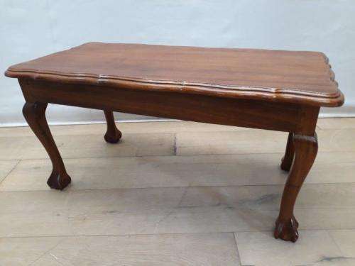 A lovely vintage Imbuia ball and claw coffee table