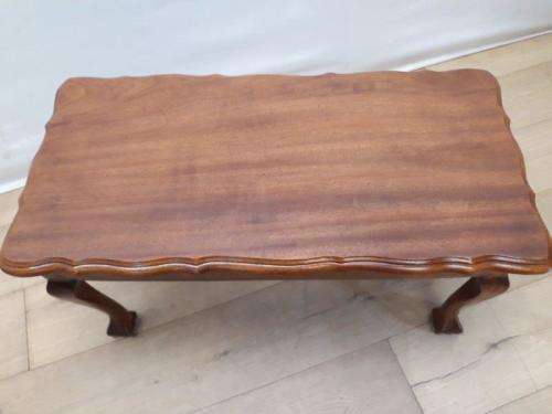 A lovely vintage Imbuia ball and claw coffee table