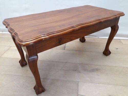 A lovely vintage Imbuia ball and claw coffee table