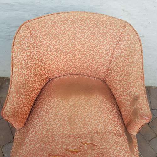 A stylish wrought iron and wood base armchair for restoration