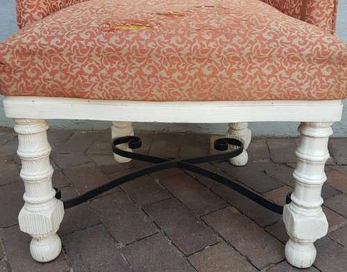 A stylish wrought iron and wood base armchair for restoration