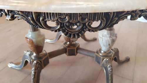 An exquisite and beautifully made round Italian marble and ornate solid brass coffee table