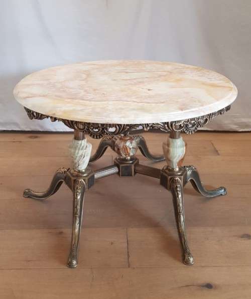 An exquisite and beautifully made round Italian marble and ornate solid brass coffee table