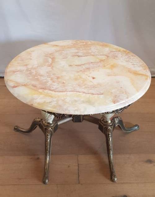 An exquisite and beautifully made round Italian marble and ornate solid brass coffee table
