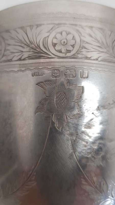 A beautiful antique (1910) hallmarked British sterling silver engraved chalice trophy