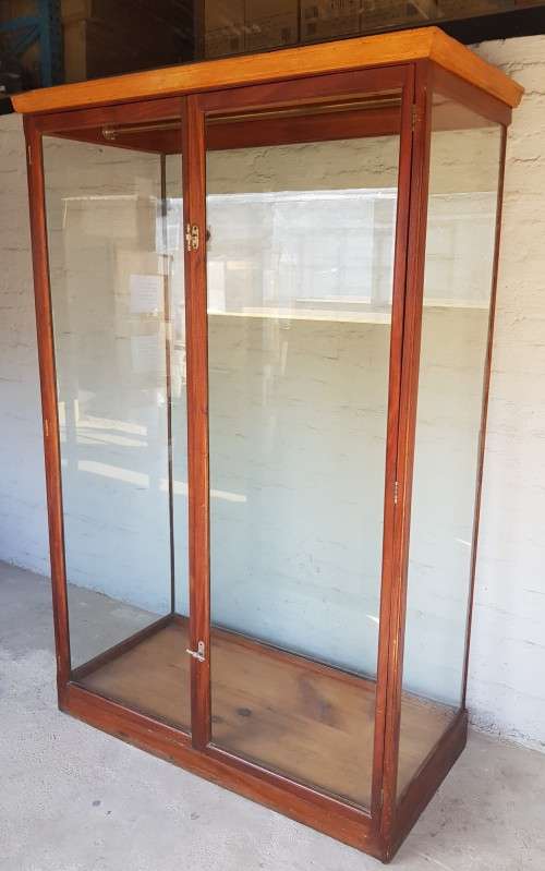 An incredible antique glass wardrobe/ cabinet with a clothes railing and beautiful fittings