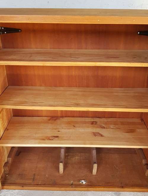 A solid Oregon pine cabinet with glass doors and wood shelves. Stunning in any home!!
