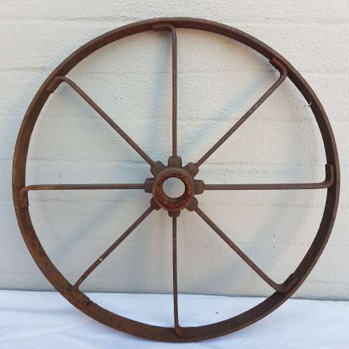 An awesome antique 8-spoke steel wagon/ carriage/ cart wheel
