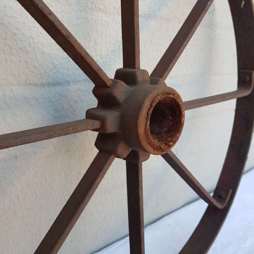 An awesome antique 8-spoke steel wagon/ carriage/ cart wheel